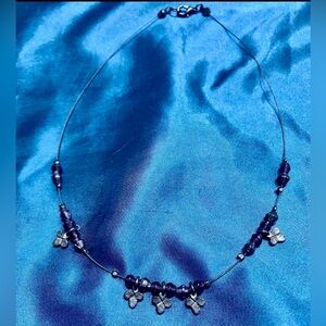 Purple Beaded Necklace with Floral Charms